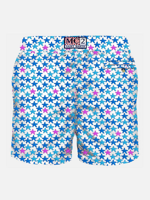 Man light fabric swim shorts with starfish print