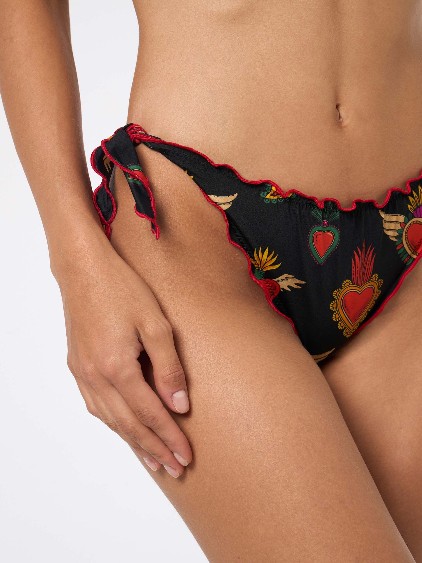 Woman cheeky swim briefs with sacred heart print