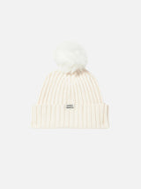 Woman white beanie with pompon