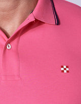 Polo piquet rosa fluo con logo St. Barth check