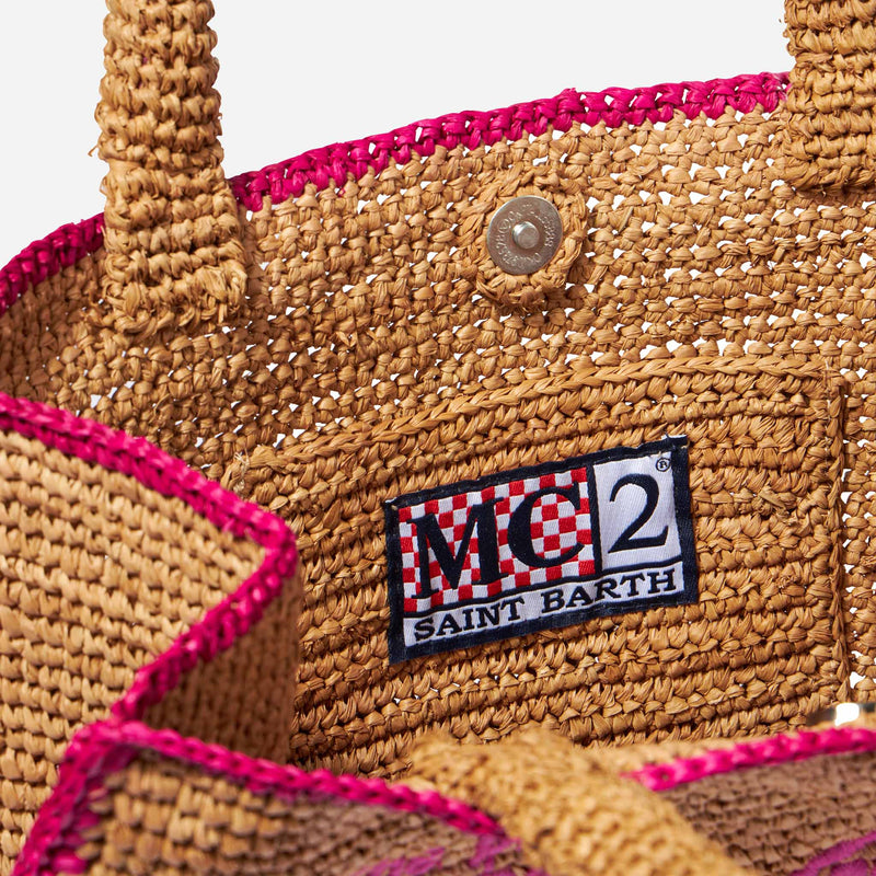 Raffia bag with fuchsia front embroidery