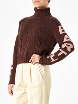 Woman brown turtleneck braided sweater