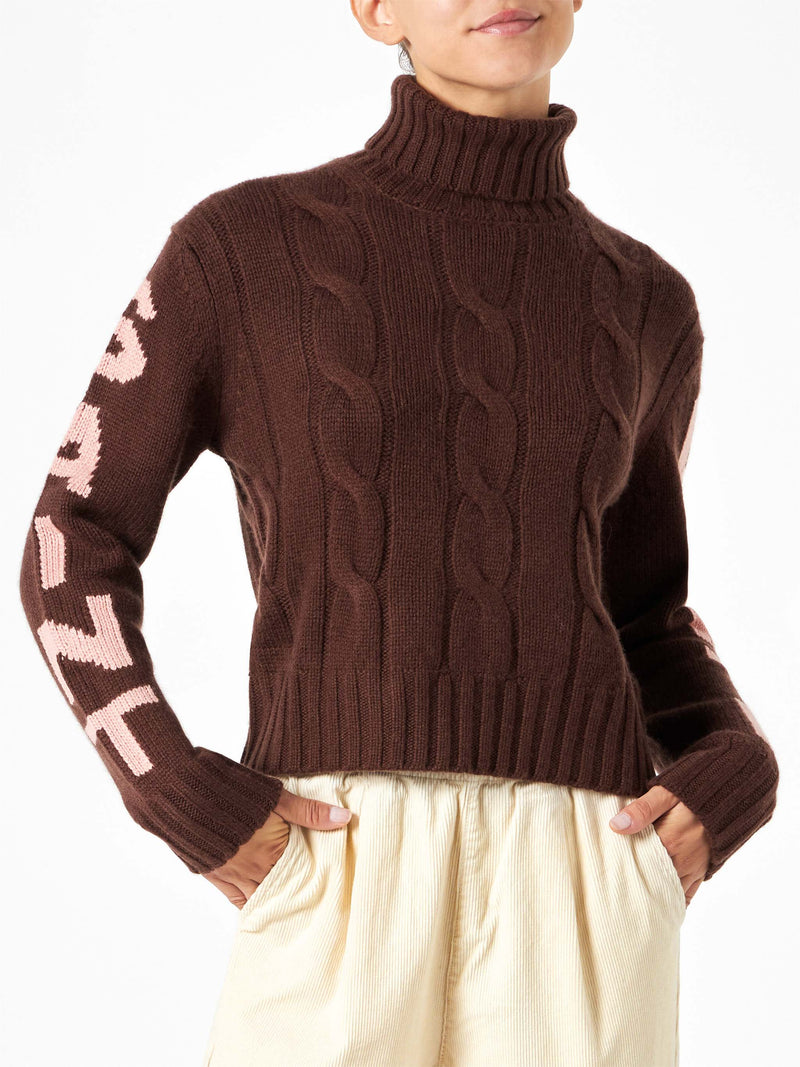 Woman brown turtleneck braided sweater