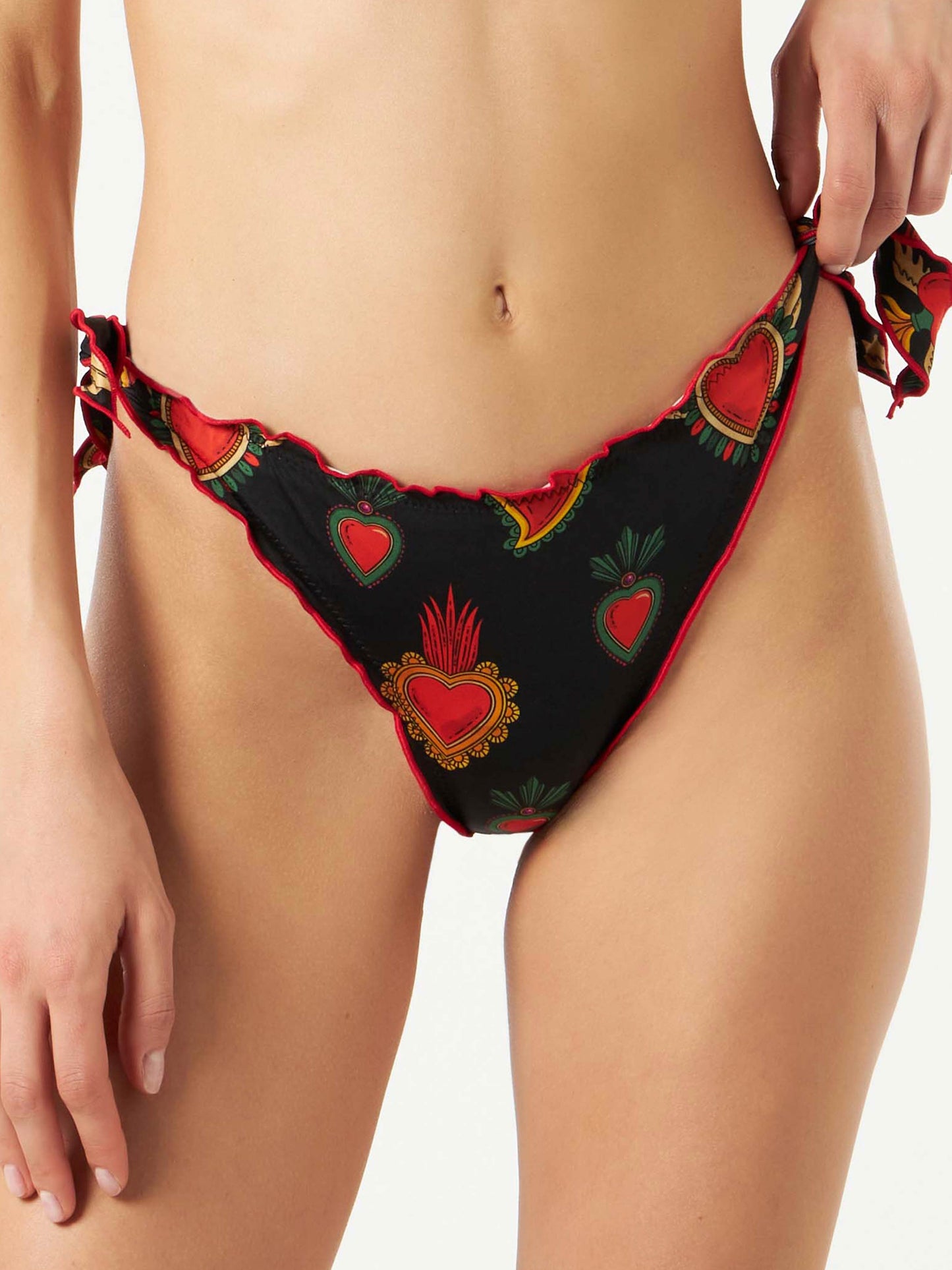 Woman ruffled cheeky swim briefs with heart print